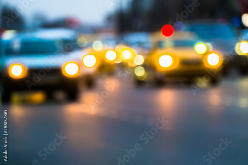 Abstract blurred background of evening city.Night traffic,colorful lights