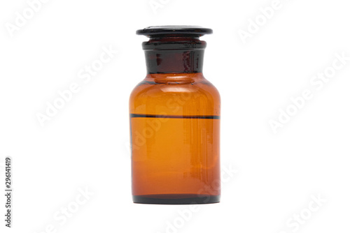 Orange color bottle with liquid isolated on white background.