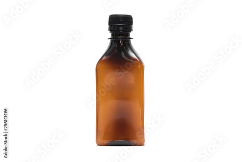 Brown plastic bottle isolated on white background.