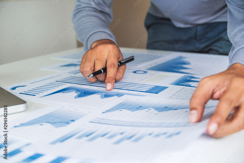 businessman working data document graph chart report marketing research development planning management strategy analysis financial accounting. Business office concept. businessman working data document graph chart report marketing research development planning management strategy analysis financial accounting. Business office concept.