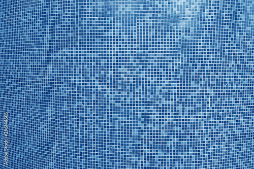 Tile mosaic of swimming pool in navy blue tone.