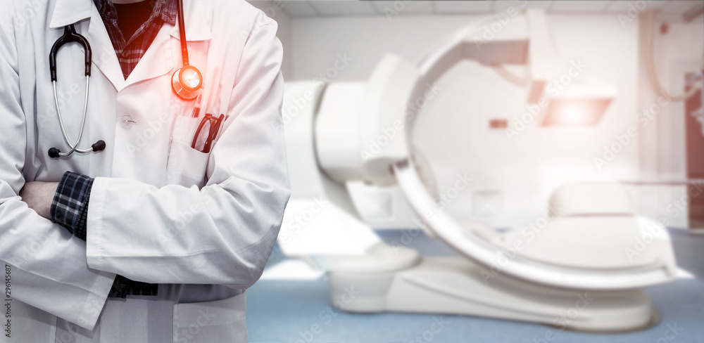 Abstract image of doctor in a white coat with a statostcope on the background of an angiograph in a modern hospital for heart surgery. Panorama.