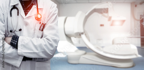 Obraz na płótnie Abstract image of doctor in a white coat with a statostcope on the background of an angiograph in a modern hospital for heart surgery. Panorama. w salonie