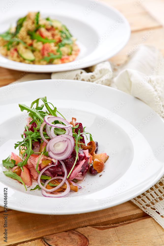 vegetarian salad with beetroot, honey agaric and red onion