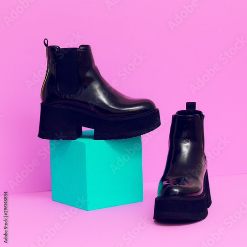 Patent leather fashion boots on platform. Style concept art photo