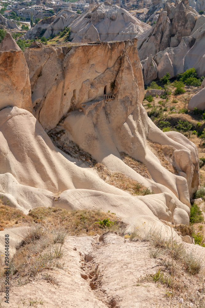 rock formations with cave houses at Uchisar, Cappadocia, Turkey