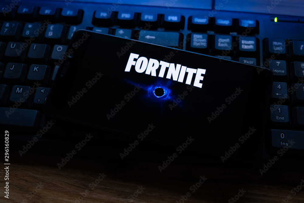 Kostanay, Kazakhstan, October 15, 2019.Mobile phone on the background of  the keyboard, with the logo of the popular game fortnite 2, from Epic  Games. Stock Photo | Adobe Stock