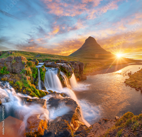 Fotografie, Obraz Beautiful landscape with sunrise on Kirkjufellsfoss waterfall and Kirkjufell mountain, Iceland, Europe
