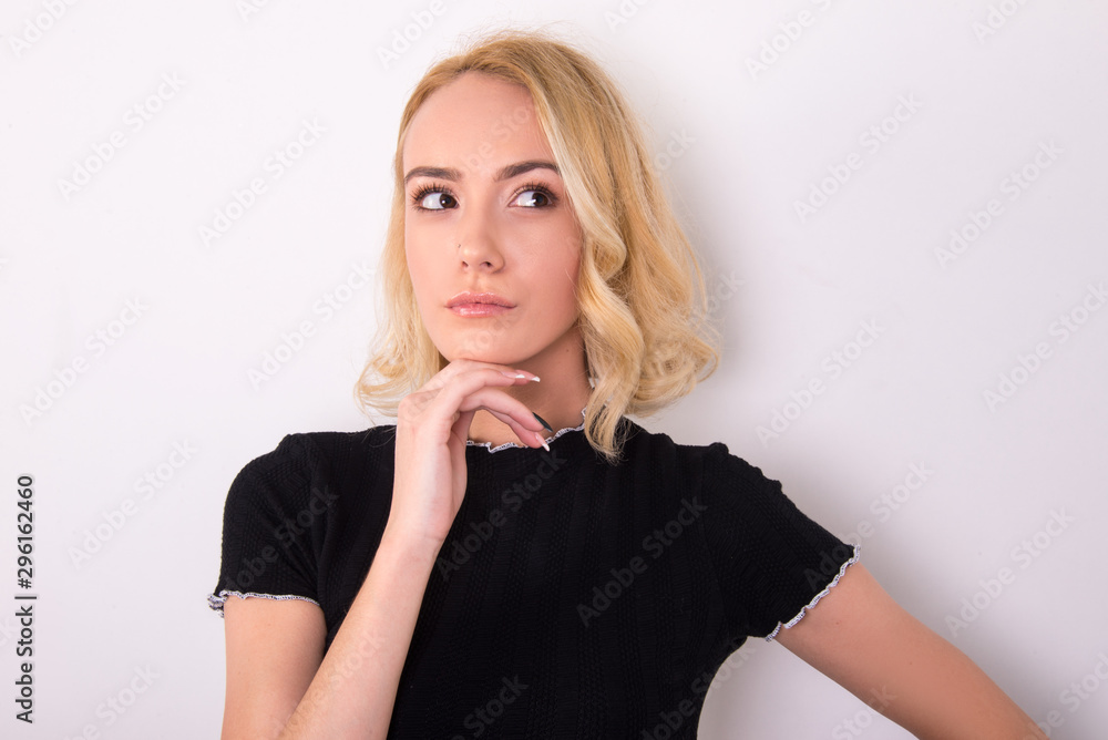 thinking face expression, young woman, girl model thinking isolated in studio, close up thinking face expression, young woman, girl model thinking isolated in studio, close up