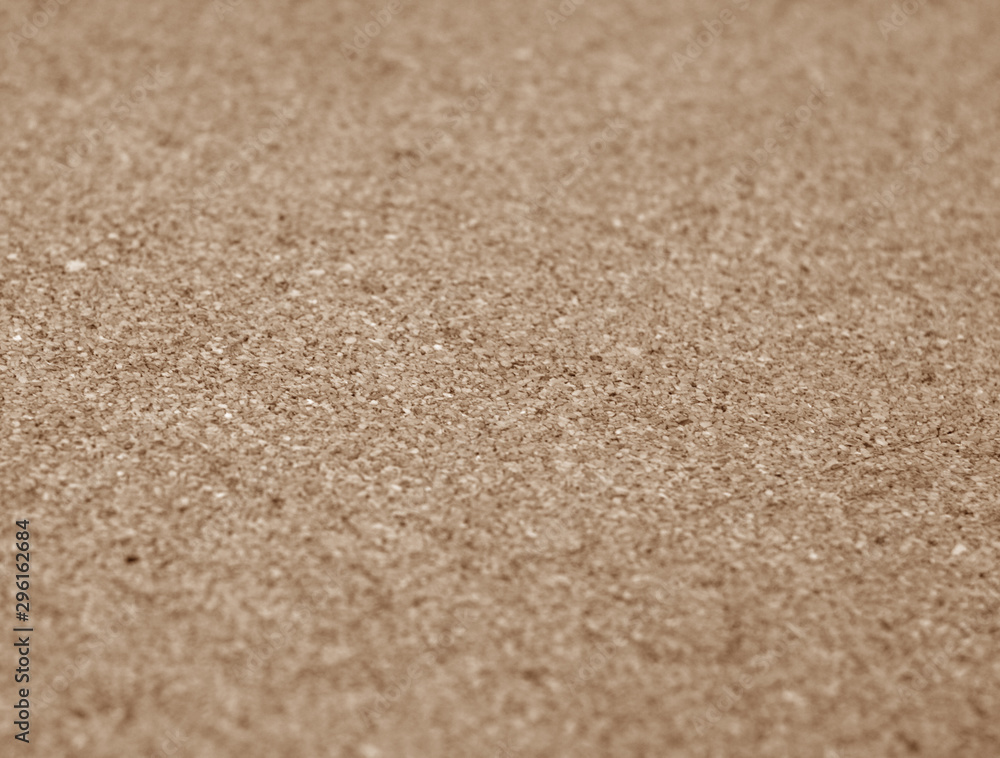 Natural cork texture with blur effect in brown color. Natural cork texture with blur effect in brown color.