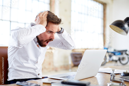 Business man shocked about stock rates