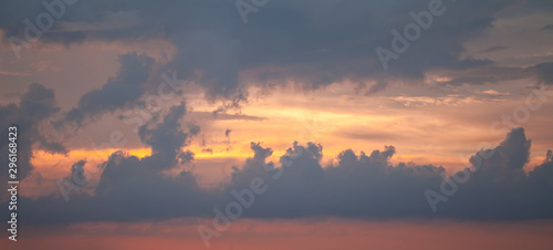 Colorful tropical sky at sunset, wide background