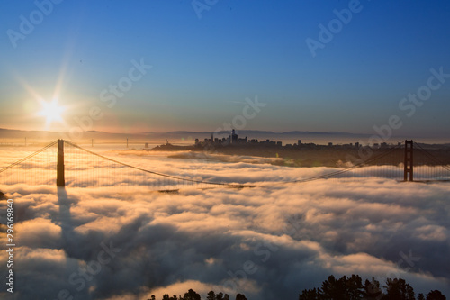 Aerial view of Golden Gate Bridge with Low Fog at Sunrise