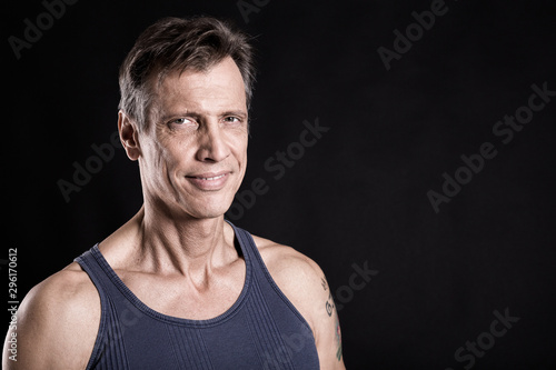 40-50 years old fit man with a vest looking at the camera © DanieleCruciani.it