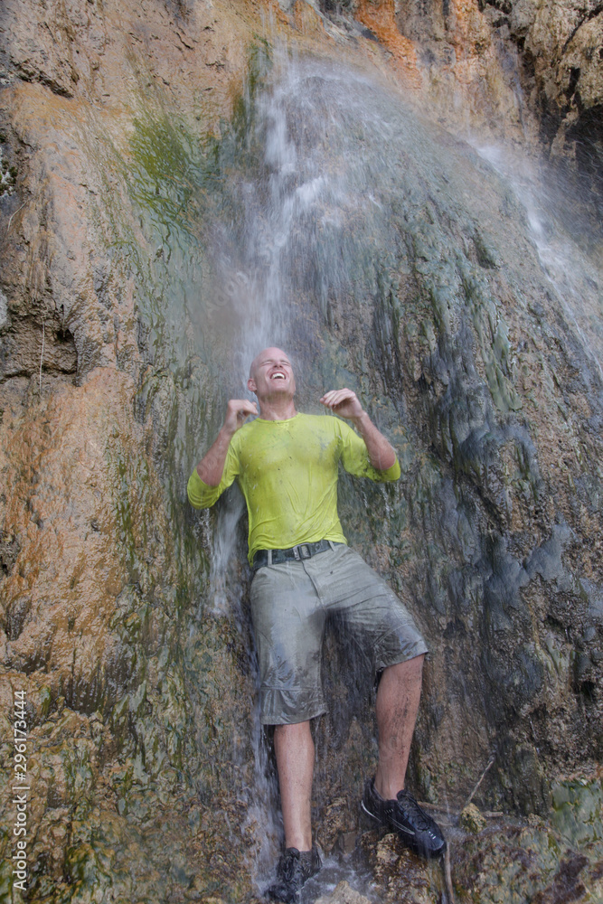 Male mountain biker in rugged setting Male mountain biker in rugged setting