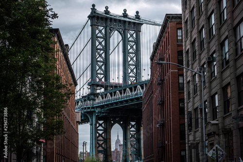 View of one of the towers of the Manhattan Bridge from the streets of the DUMBO district, Brooklyn, NYC  © FitchGallery