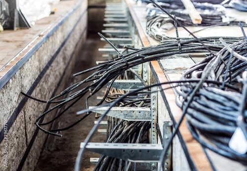 A large number of cables laid in the relay room