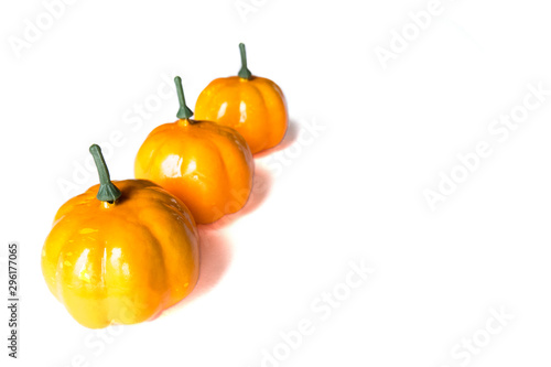 Halloween and harvest concept. Isolated autumn background of fruits and vegetables: pumpkins on a white background with copy space