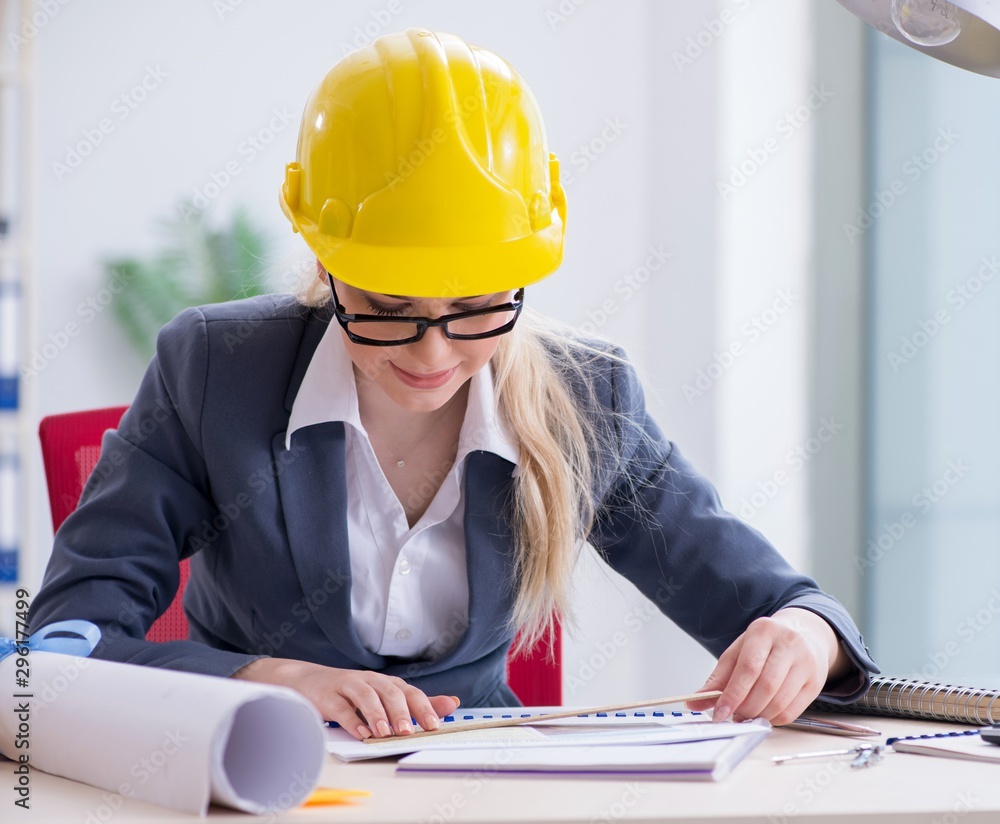 Woman architect working on the project Woman architect working on the project
