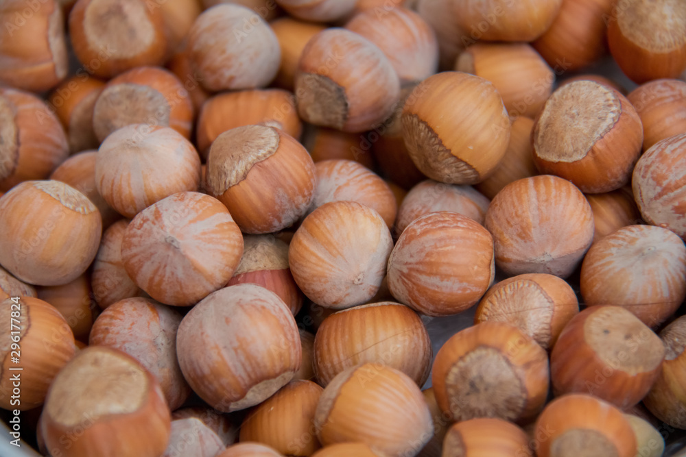 Food background. Hazelnuts texture. Top view . Hazelnut Nut Health Organic Brown Filbert Autumn Background Concept . Hazelnuts. Stack of hazelnuts. Food background. Hazelnuts texture. Top view . Hazelnut Nut Health Organic Brown Filbert Autumn Background Concept . Hazelnuts. Stack of hazelnuts.