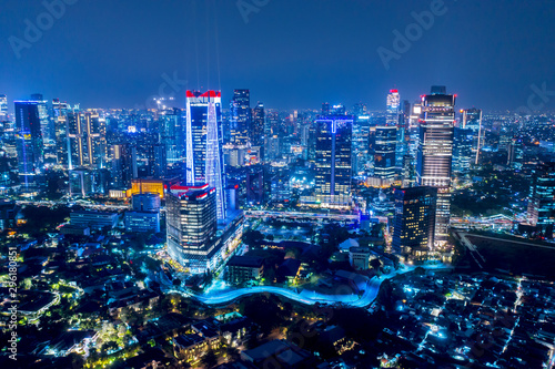 Glowing skyscrapers at night in Jakarta city