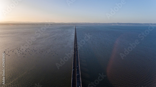 Aerial. Vasco da Gama bridge over the Tagus River in the capital of Lisbon. © sergojpg