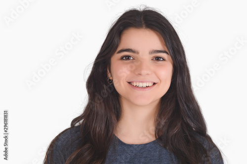 Portrait of young latin woman in a studio.