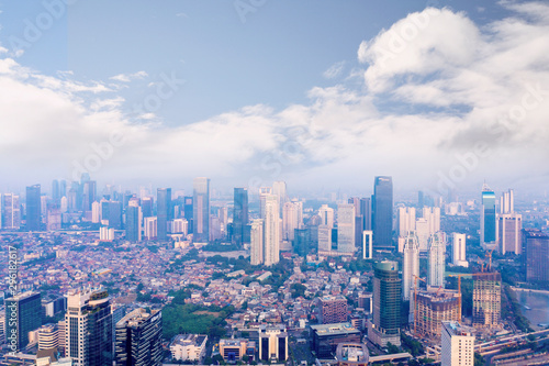 Jakarta cityscape with air pollution smoke