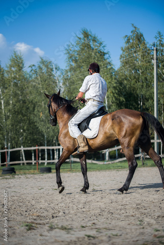 Horseman on horseback, ranch, horse farm. Golop, riding lessons. © Jane_S