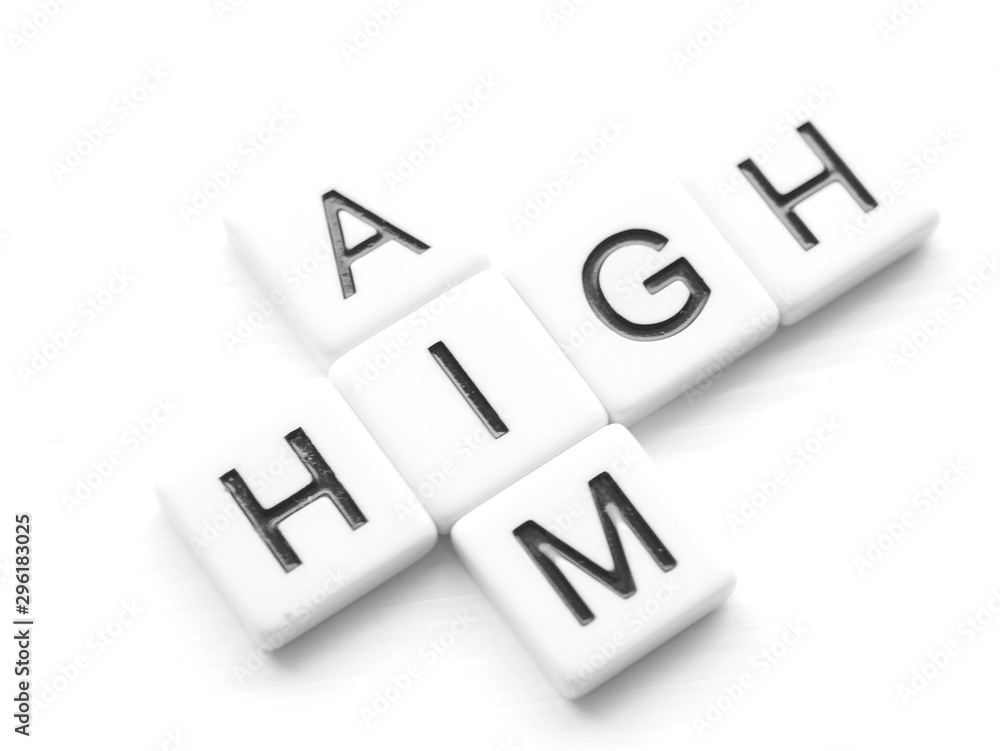 Words aim and high in crossword style in black lettering on white tiles Words aim and high in crossword style in black lettering on white tiles
