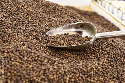 Fresh Peppercorns with silver scoop