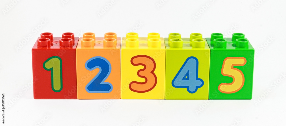 Fototapeta premium Bright and colorful numbers in order from 1 to 5 shown on the designer. training children in counting.