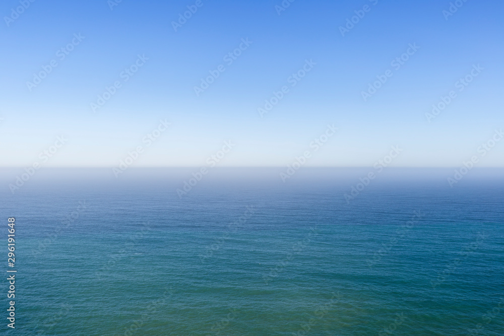 Tranquil view of the calm Atlantic ocean on a sunny day. Copy space. Good for background. Tranquil view of the calm Atlantic ocean on a sunny day. Copy space. Good for background.