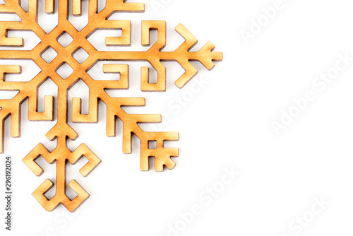 Natural, real, wooden snowflake - Christmas tree decoration. Great design for the New year greeting card and holiday concept. Close-up. Isolated on white background. Place for text. Copy space. photo