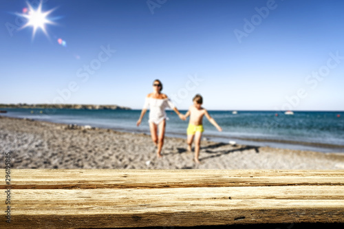 desk of free space and beach background 