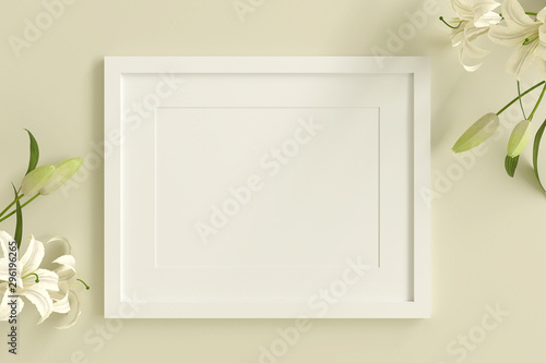 empty white picture frame for insert text or image inside with white flower decorate on yellow pastel color..