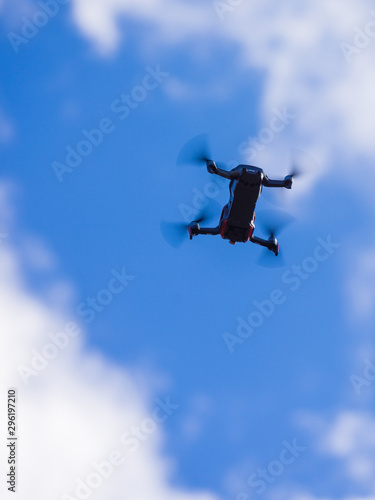 Drone flying over sky background