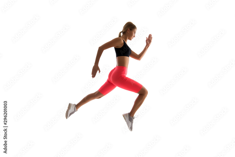 Dynamic movement. Woman runner isolated on white. Jogger running. Sporty runner in fashionable sportswear. Fitness and sport motivation. Strong and fit. Athletic woman sprinter or runner. Best runner
