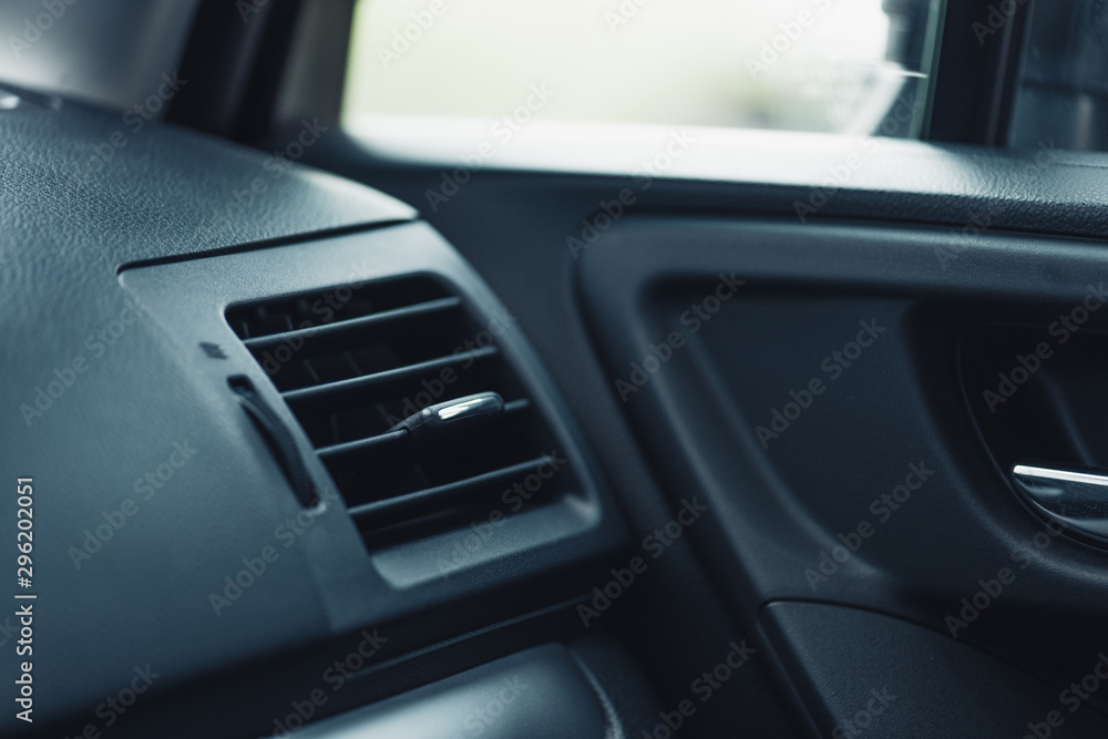 adjustable ventilation grille on dashboard of modern car