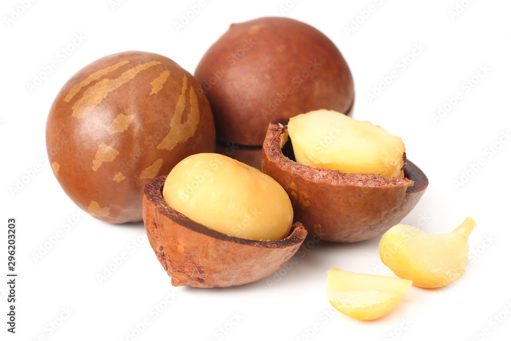 Macadamia nut with pieces isolated on a white background Macadamia nut with pieces isolated on a white background