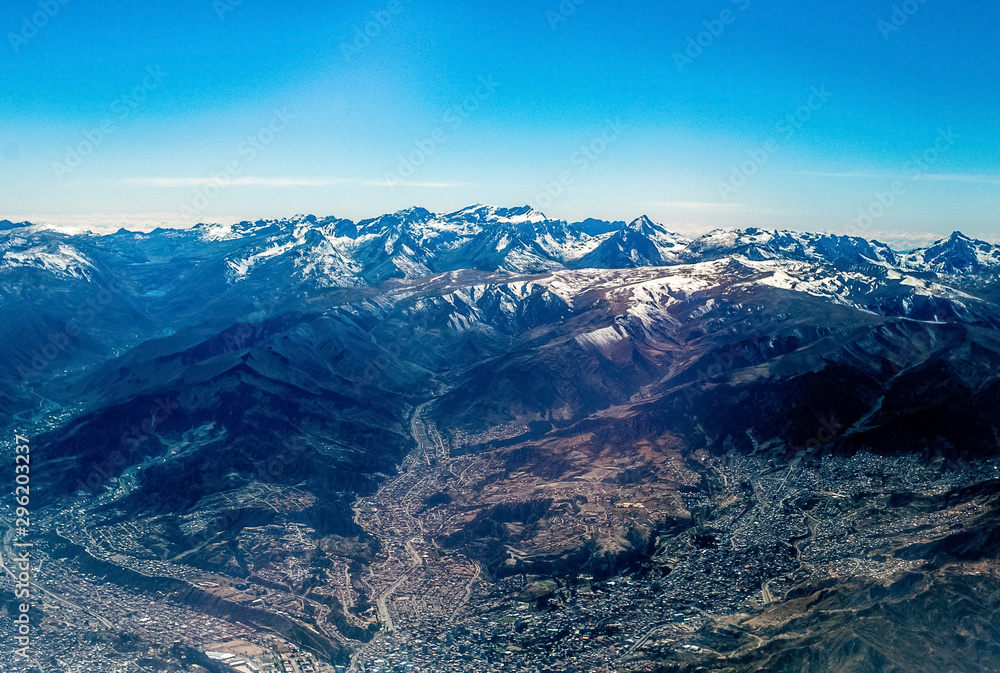 The City of La Paz, Bolivia Seen From The Sky With Snowy Mountains Peaks of The Andes Cordillera