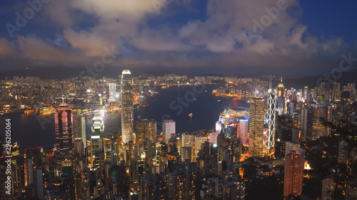 night shot of victoria harbour and hong kong from the peak