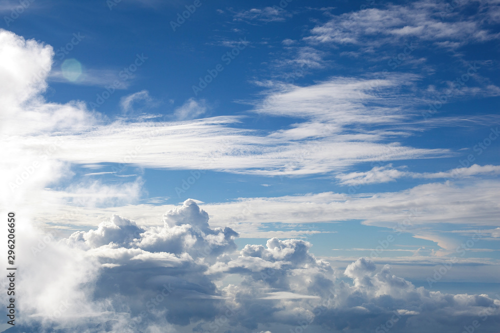 Fototapeta premium Above the clouds. In the air. Cloudy background