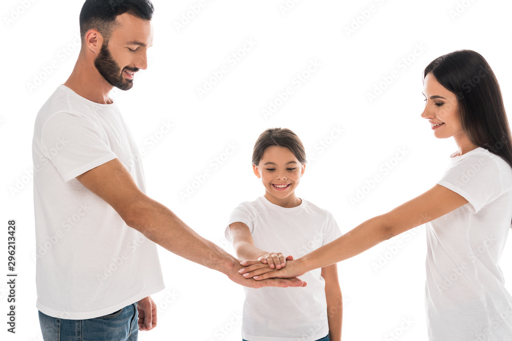 happy family putting hands together isolated on white