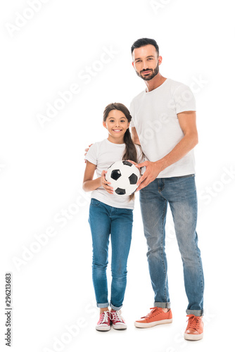 happy father and daughter holding football isolated on white