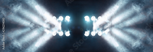 Stage lights and fog or misty in the dark.Musical background.Set of lights. Concept of live music and concerts.