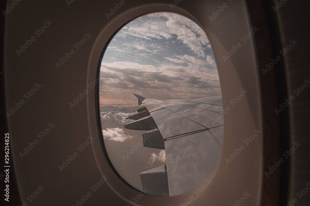 looking outside an airplane window looking outside an airplane window