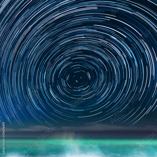 Star-trails above the Caribbean sea  in Jamaica  with the Northern Star in the center of the image.