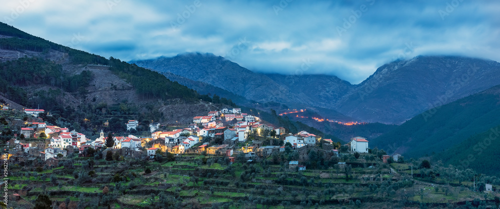 Panoramic view of the village of Cabeça in Serra da Estrela, Portugal, at dusk and with the Loriga throat in the background.