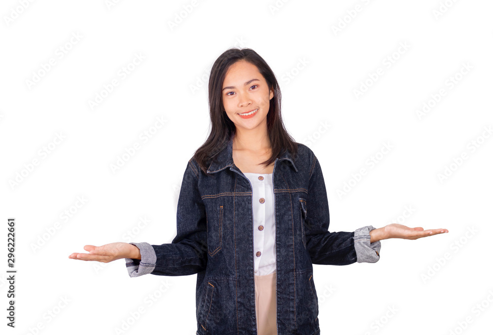 An Asian girl in jeans jacket and shorts posing open hands front of the camera An Asian girl in jeans jacket and shorts posing open hands front of the camera